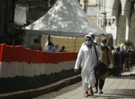 "Delhi High Court building with Tablighi Jamaat members in background representing Covid-19 case."
